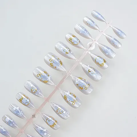Bow and Snowflake Gold Foil Christmas Cat Eye Press-On Nails design 1