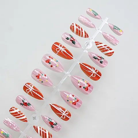 Magenta Bow and Bell Christmas Cat Eye Almond Press-On Nails design 1