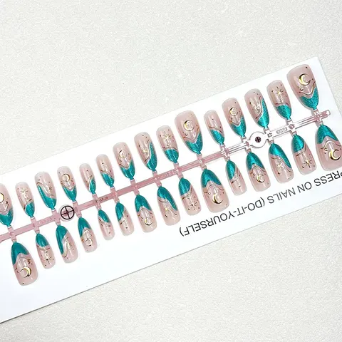 Ocean Star and Moon Gold Foil Cat Eye Almond Press-On Nails design 1