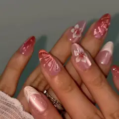Coral Flower Shell-Texture French Cat Eye Press-On Nails on hand